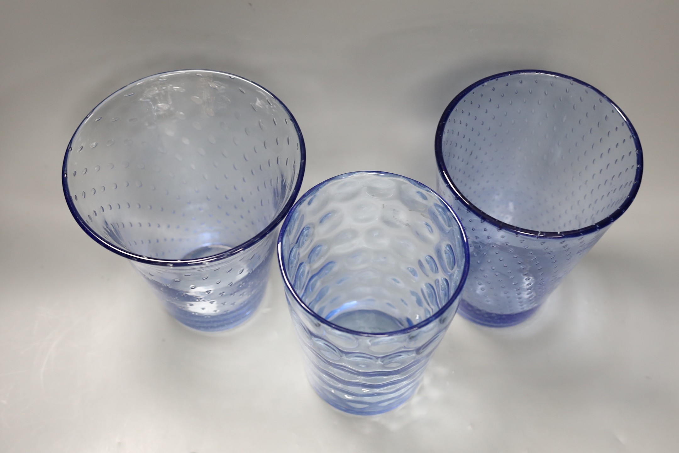 Three Whitefriars blue art glass vases. Tallest 20cm